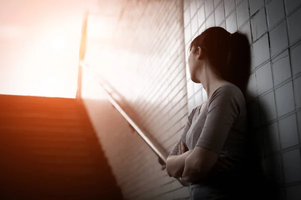 Depressed woman in underground — Stock Photo, Image