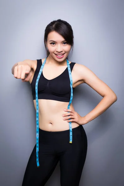 Beauty sport woman pointing — Stock Photo, Image