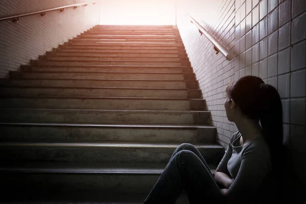 Woman sitting  and looking  somewhere — Stock Photo, Image