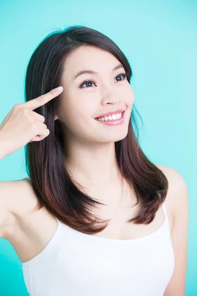 Skincare woman pointing  her eye — Stock Photo, Image