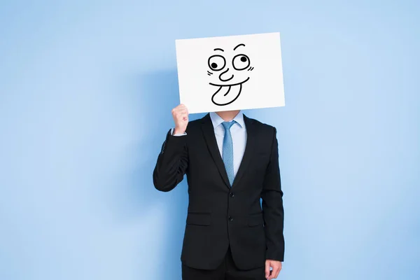 Homem de negócios segurando cartaz engraçado — Fotografia de Stock