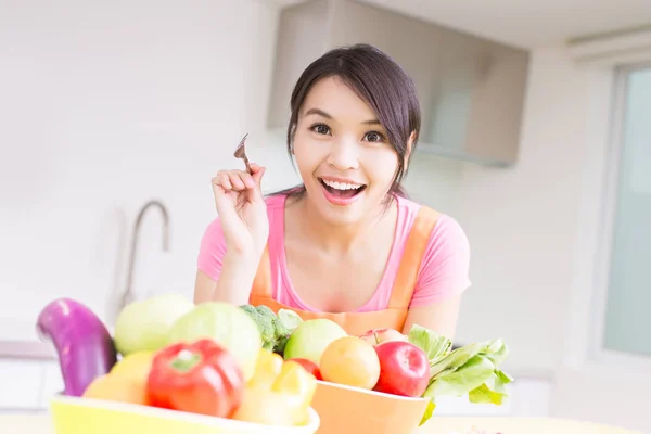 Beauty housewife with  fork — Stock Photo, Image