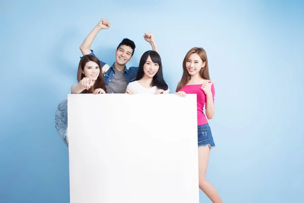 Happy  students holding  billboard — Stock Photo, Image