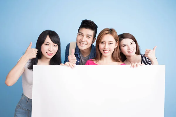 Happy  students holding  billboard — Stock Photo, Image