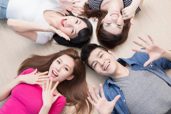 People  lying on floor — Stock Photo, Image