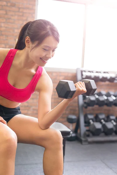 Sport woman holding  dumbbell — Stock Photo, Image