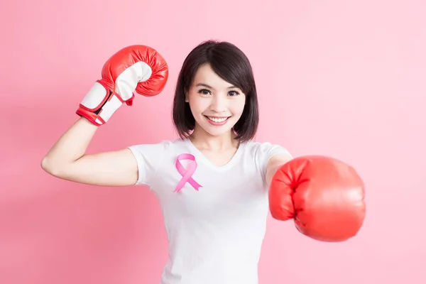 Mujer con signo de salud en el pecho —  Fotos de Stock