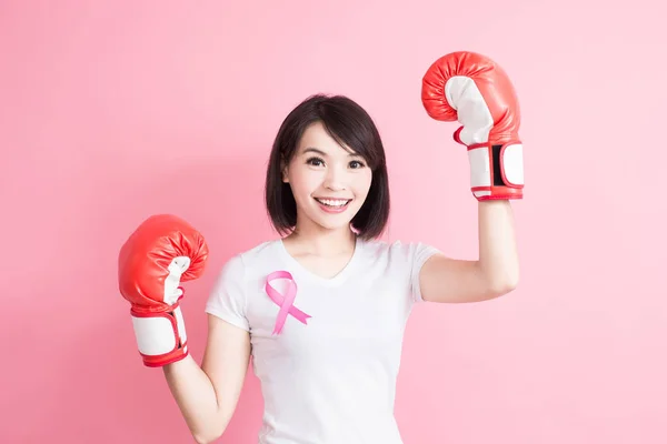 Mujer con signo de salud en el pecho —  Fotos de Stock