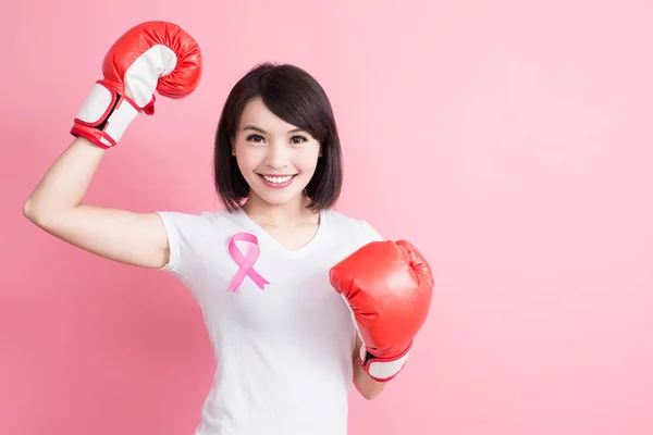 Mujer con signo de salud en el pecho —  Fotos de Stock