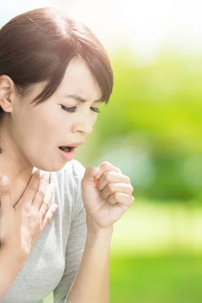 Young woman coughing — Stock Photo, Image