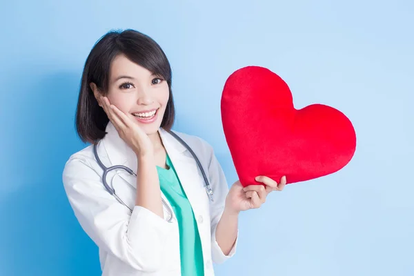 Woman doctor with  heart — Stock Photo, Image