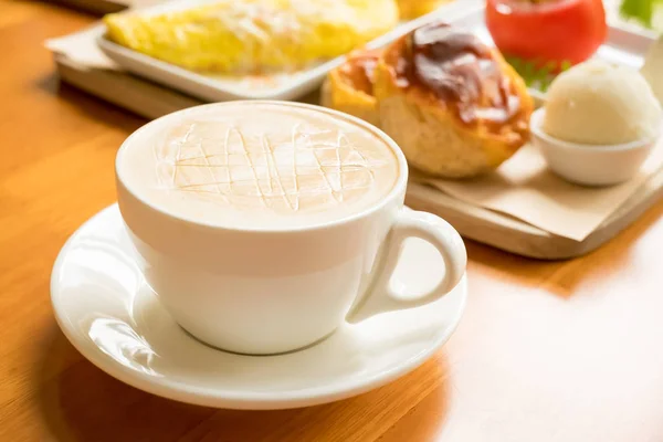 Cup of coffee  on the table — Stock Photo, Image