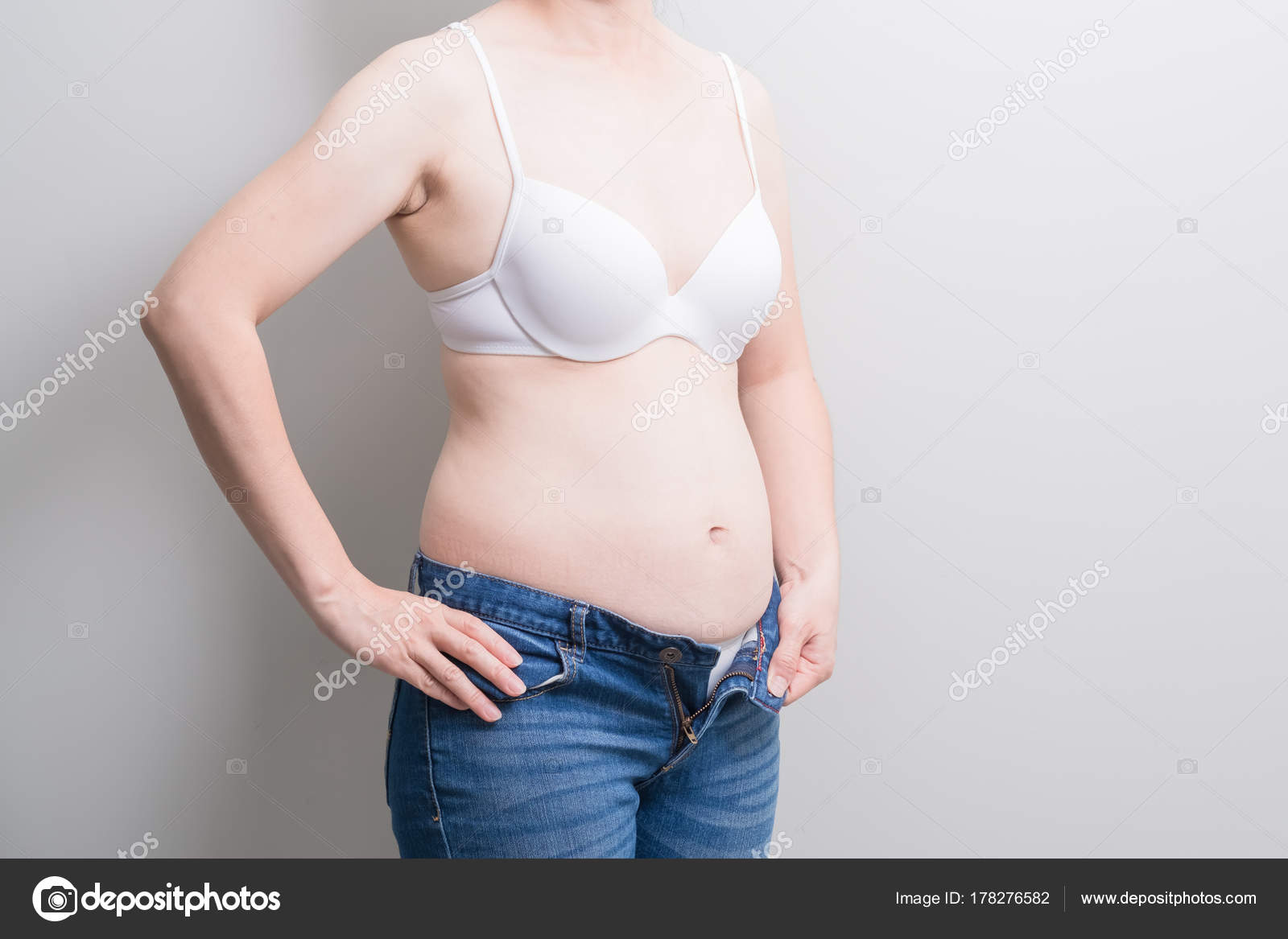 Fat Overweight Woman Wearing Jeans Gray Background Stock Photo by  ©ryanking999 178276582