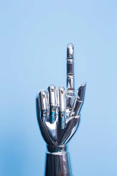 Tangan Robot Menunjukkan Sesuatu Pada Latar Belakang Biru — Stok Foto