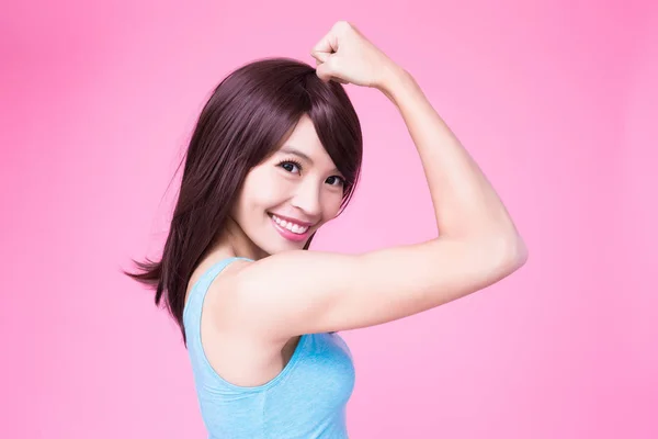 Mujer Mostrando Fuerte Brazo Usted Fondo Rosa —  Fotos de Stock