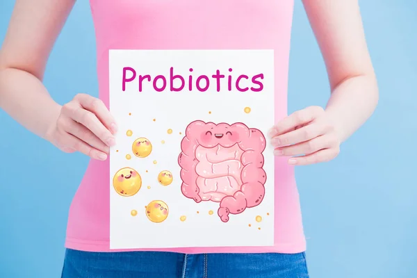 Frau Mit Probiotika Plakat Auf Blauem Hintergrund — Stockfoto