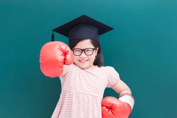 Cute Girl Wearing Bachelor Cap Gloves Blank Green Chalkboard Background — Stock Photo, Image