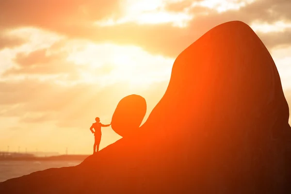 Silhouette Man Pushing Stone Mountain Sunset — Stock Photo, Image