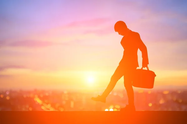 Silhouette Business Man Kicking Something Sunset — Stock Photo, Image