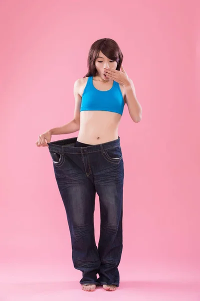 Woman Wearing Jeans Showing Weight Loss Pink Background — Stock Photo, Image