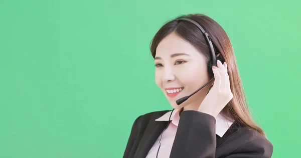 Businesswoman Wearing Headset Green Background — Stock Photo, Image