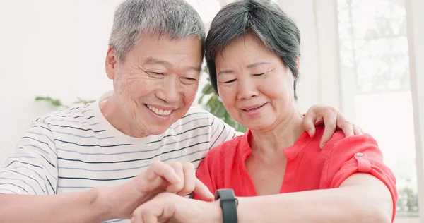 couple use wearable smart watch