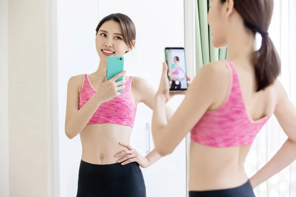 Sport woman take selfie — Stock Photo, Image