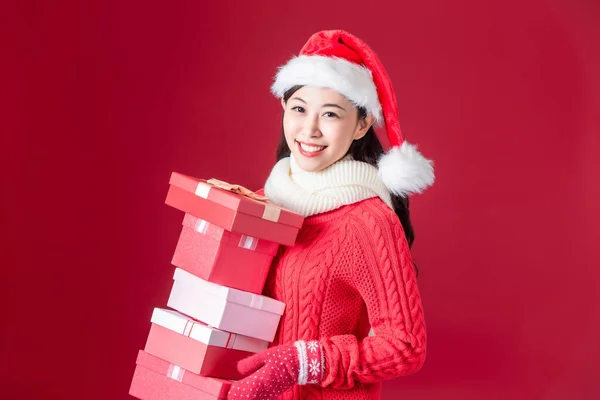 Asian woman hold christmas gifts — Stock Photo, Image