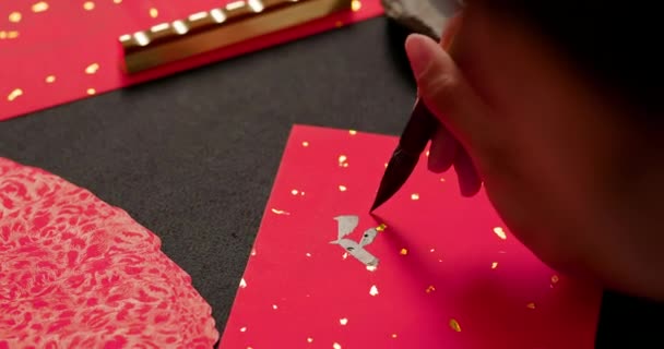 Calligrafia con distico a molla rosso — Video Stock