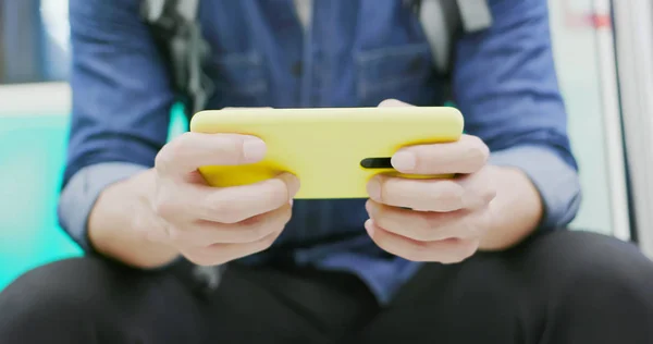 Asian man play mobile game — Stock Photo, Image