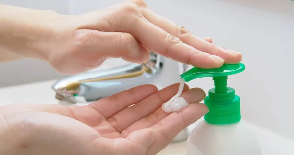 Close Woman Hands Pushing Pump White Plastic Soap Bottle Prevent — Stock Photo, Image