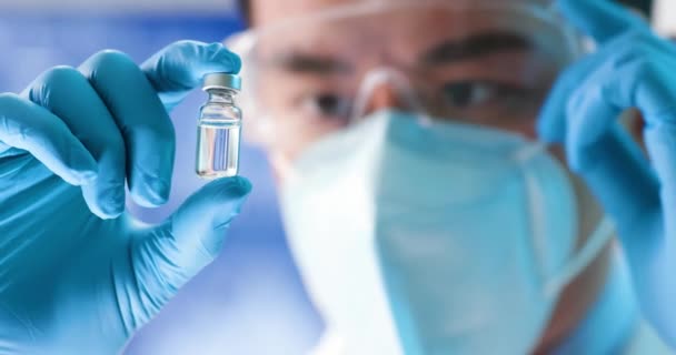 Scientist look to newest vaccine Royalty Free Stock Footage
