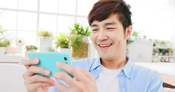 Asian Man Play Game Smart Phone Smile — Stock Photo, Image