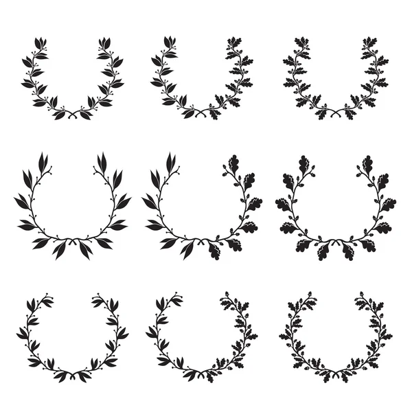 Silhouette laurel and oak wreaths in different  shapes — Stock Vector