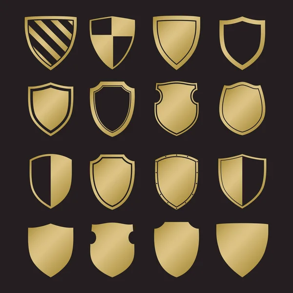 Shield silhouettes in gold colour — Stock Vector