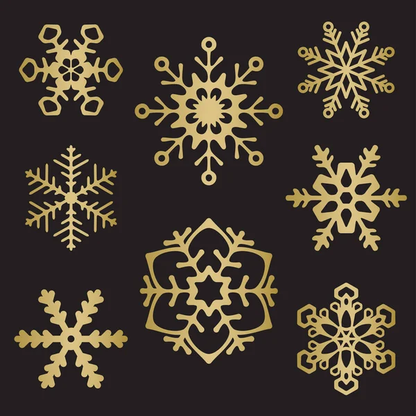 Gold Ornate Snowflake silhouettes — Stock Vector