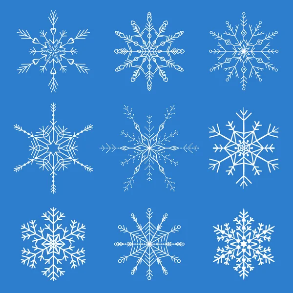 Winter sneeuwvlok silhouetten — Stockvector