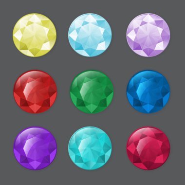 Farklı renklerde yuvarlak değerli taşlar kümesi