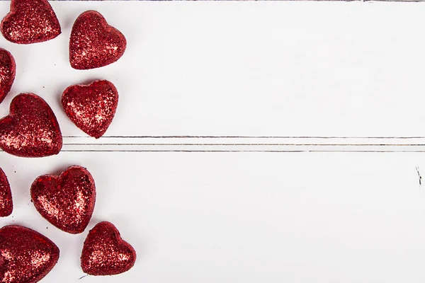 Red Glitter Hearts White Wooden Background — Stock Photo, Image