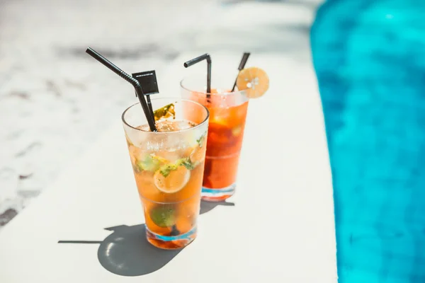 details of refreshment drinks at pool bar served ice cold on a sunny day