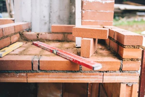 Industrial details of masonry, level and bricks. — Stock Photo, Image