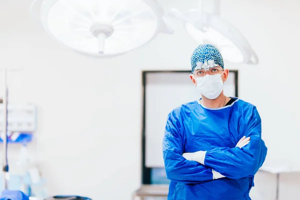 Portrait of plastic surgeon with sterile equipment working in hospital operating room — Stock Photo, Image