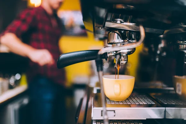 Espresso machinery pouring freshly brewed coffee in cafe shop. barista details and bartender — Stock Photo, Image