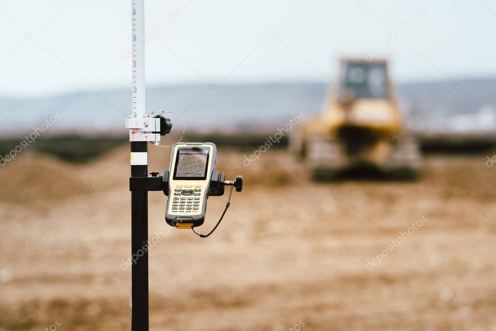 close up details of gps and theodolite in surveying industry. Construction site details