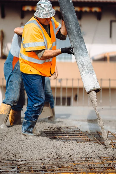 Industrial Workers Pouring Cement Manual Pump Tube — Stock Photo, Image