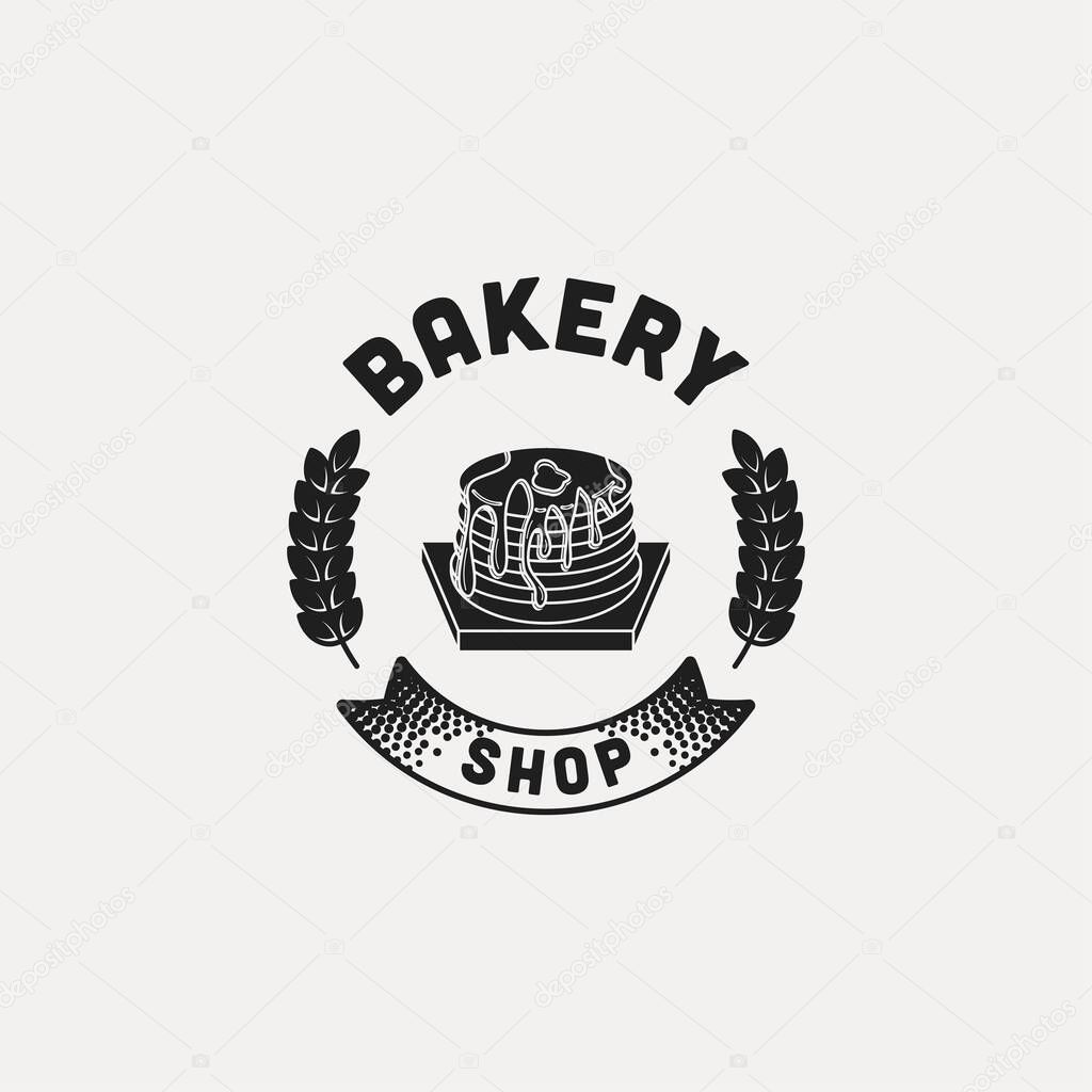Pancake, vintage bakery logo Ideas. with ribbon and wheat. Inspiration logo design. Template Vector Illustration. Isolated On White Background