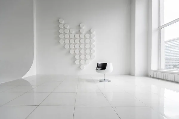 modern and futuristic contemporary interior in white colors with stylish chair and decorative wall