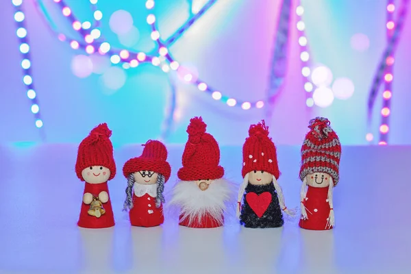 Christmas gnome family isolated on white with duotone neon lights background