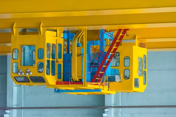 Yellow cab of industrial bridge crane — Stock Photo, Image