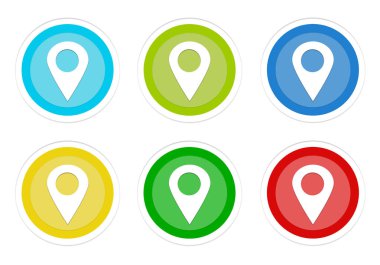 Mavi, yeşil, sarı, mavi ve kırmızı renklerde haritalarda imleçli yuvarlak renkli düğme kümesi